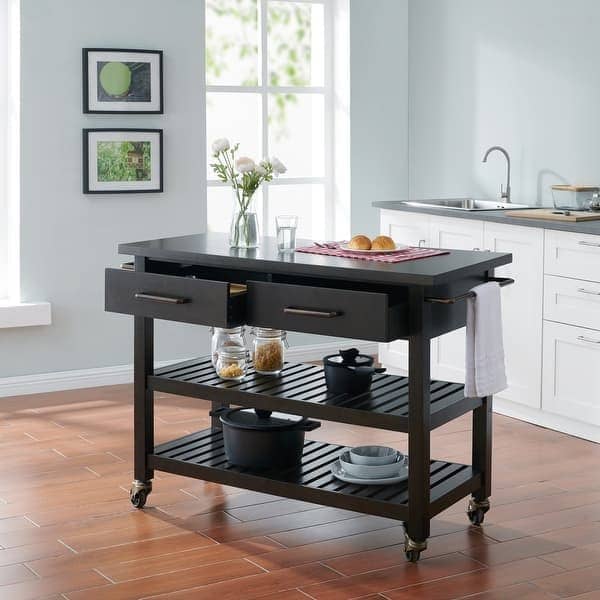 A picture of kitchen counters with appliances and utensils on top.